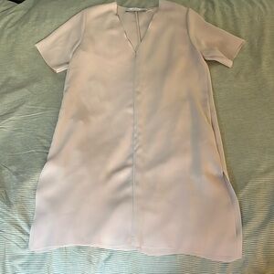 & Other Stories Tan colored t shirt style dress with side slit and pockets